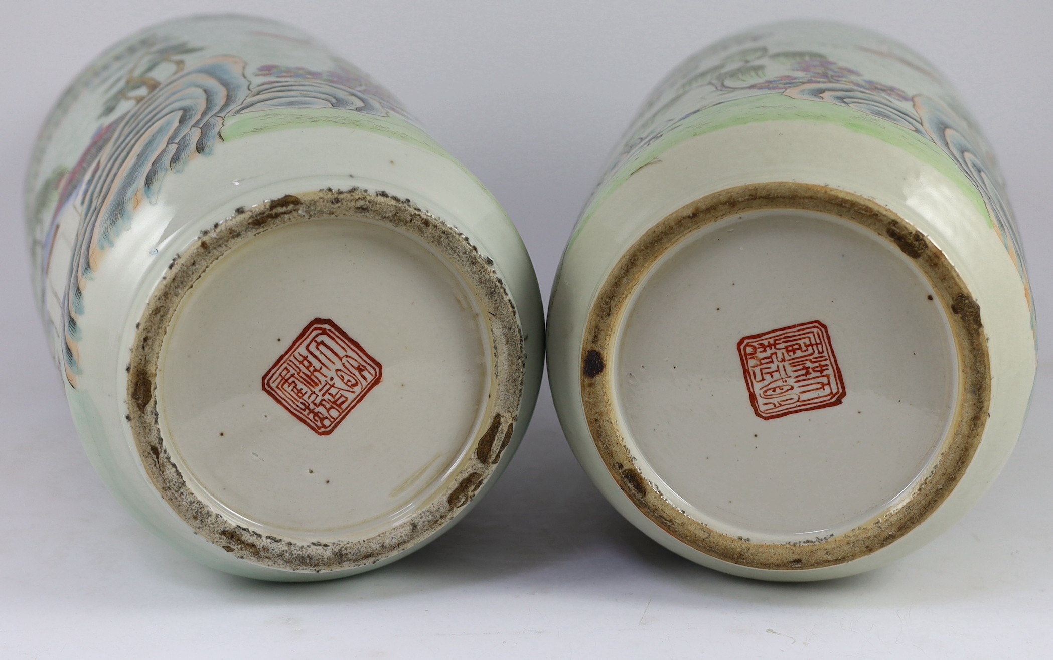 A pair of Chinese famille rose fencai inscribed vases, mid 19th century, 45cm high, cracks to neck of one vase